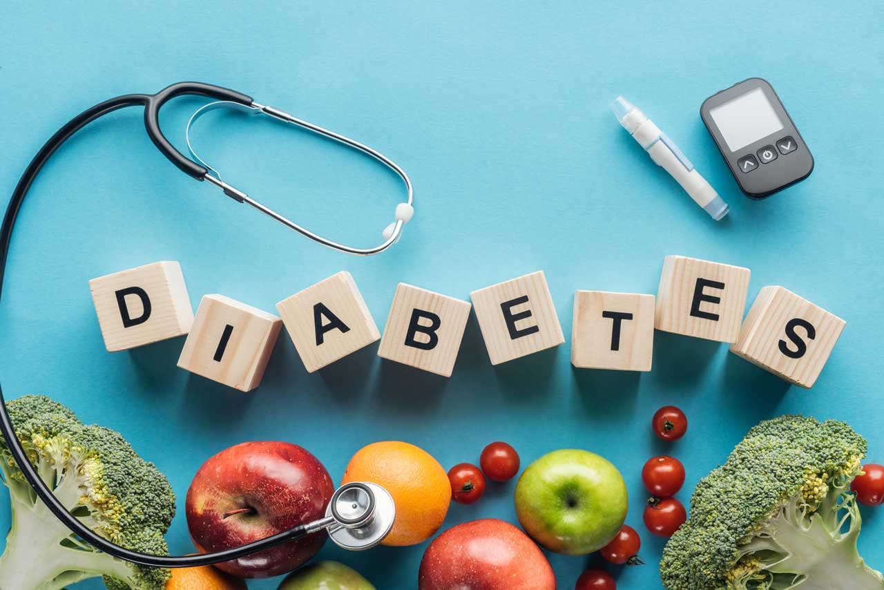 Diabetes with diabetes test, GP stethoscope and healthy fruits and vegetables
